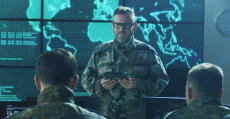 Military instructor standing in front of world map